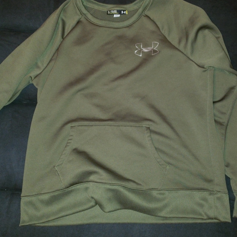 a green youth under armour sweatshirt..fits like s